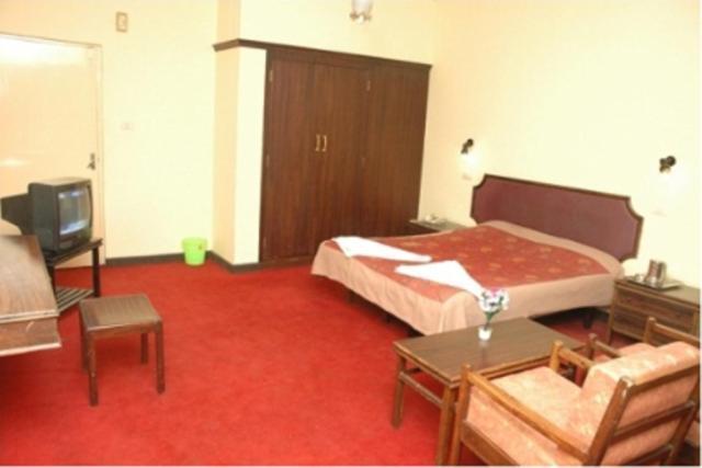 Hotel Preethi Palace Ooty Szoba fotó