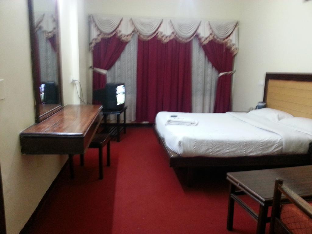 Hotel Preethi Palace Ooty Szoba fotó